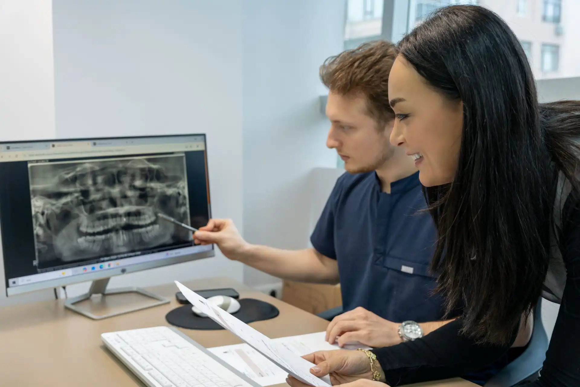 Dentist explaining treatment plan